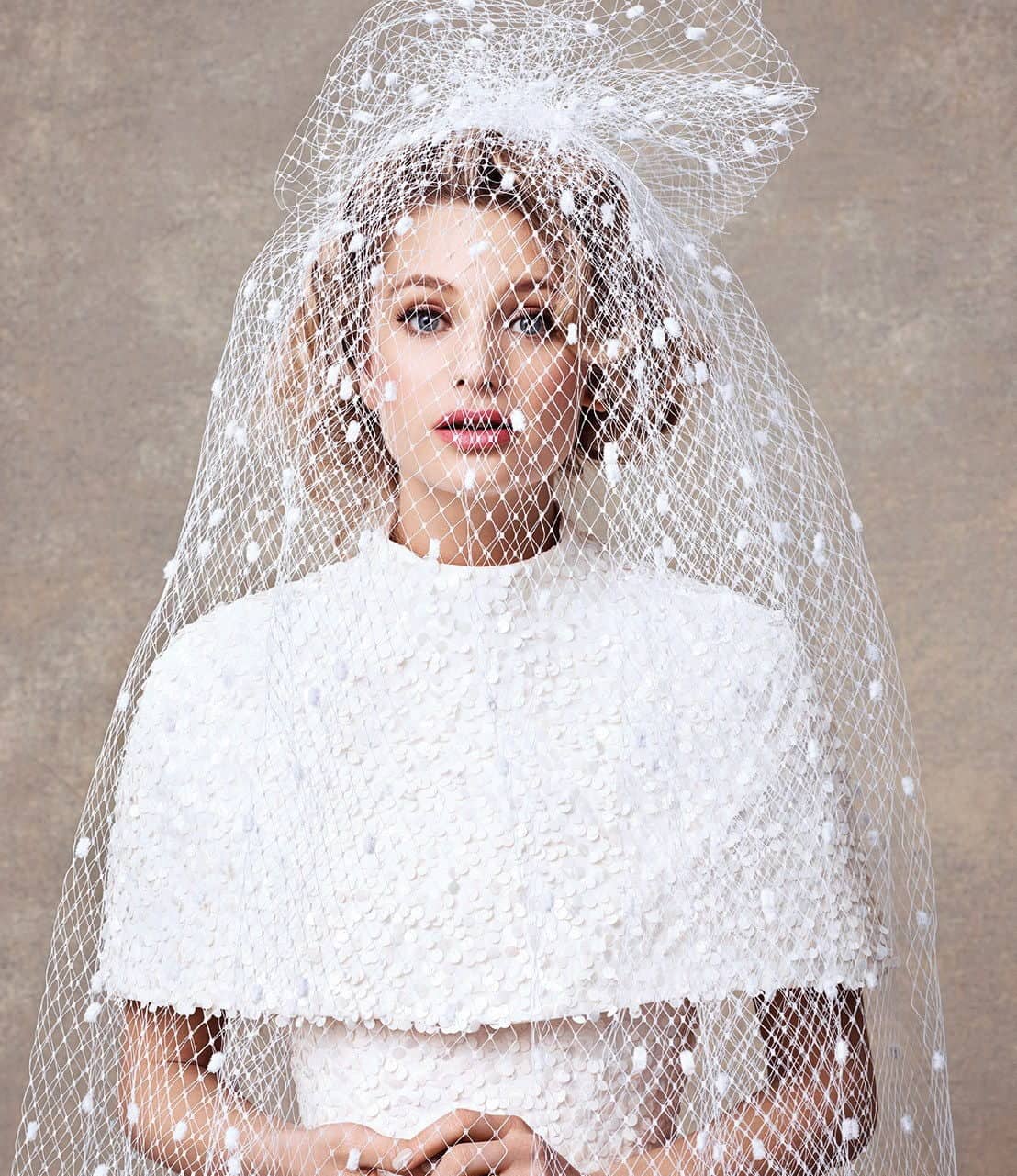 bride's hairstyling with lace veil