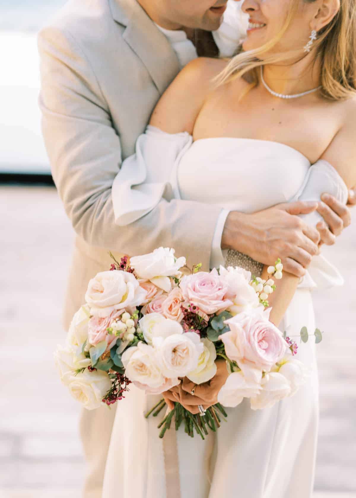 destination-pastel-seaside-18 bridal bouquet with roses and berries