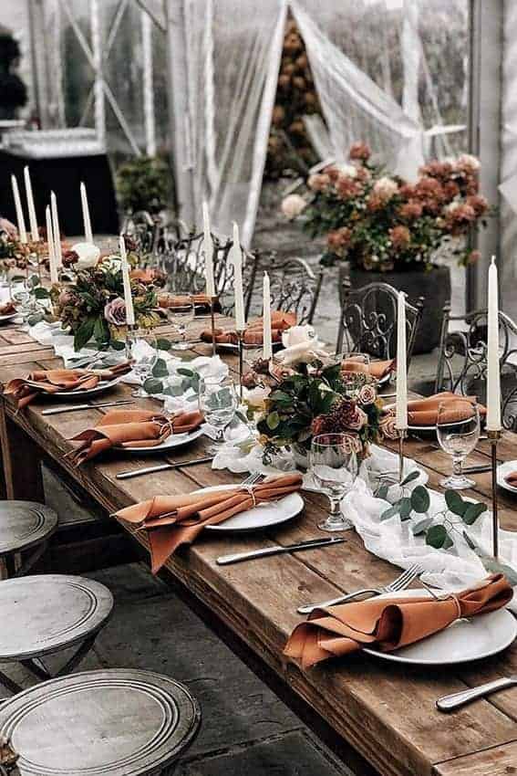 wedding table decoration in dusty orange colours
