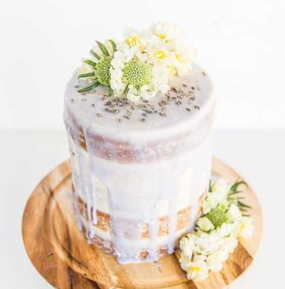 naked wedding cake with flowers