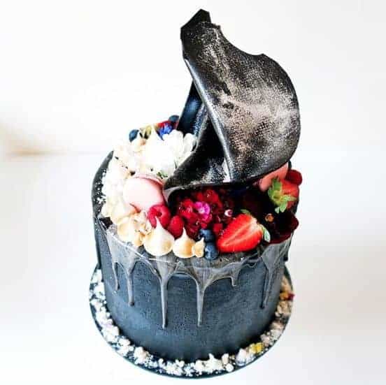 abstract wedding cake with fruits in blue colour