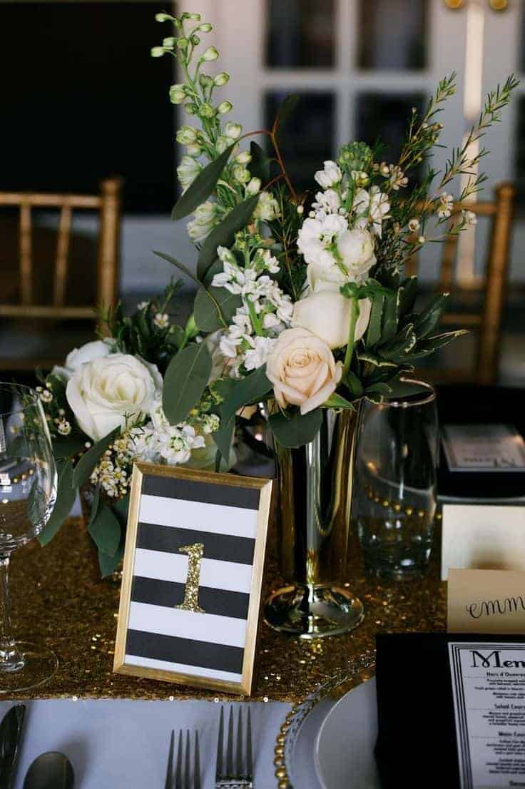 wedding dinner table numbering with a bronze frame with black and white stripes