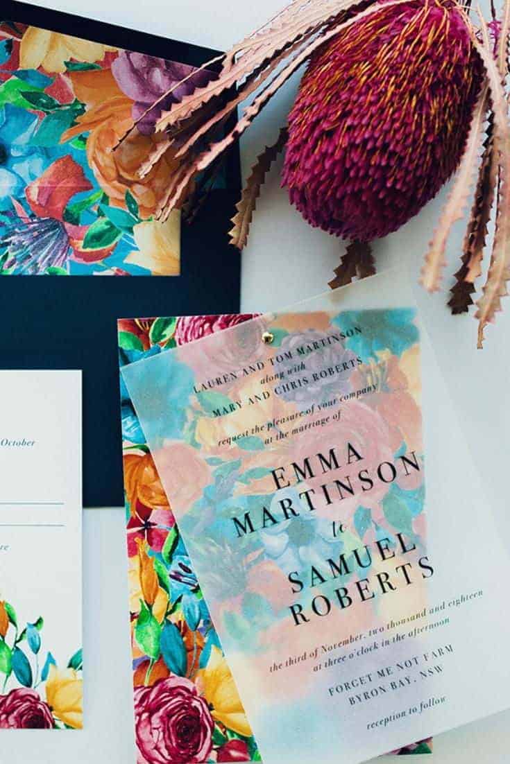 floral wedding invitation on tracing paper