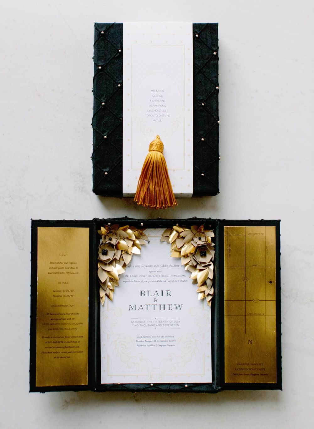 wedding invitation in black velvet box