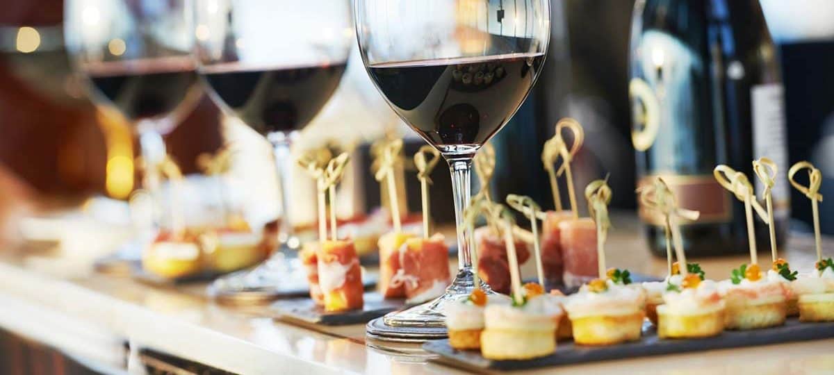 wedding-reception-wedding-catering-0 wedding catering with finger foods and glasses of red wine